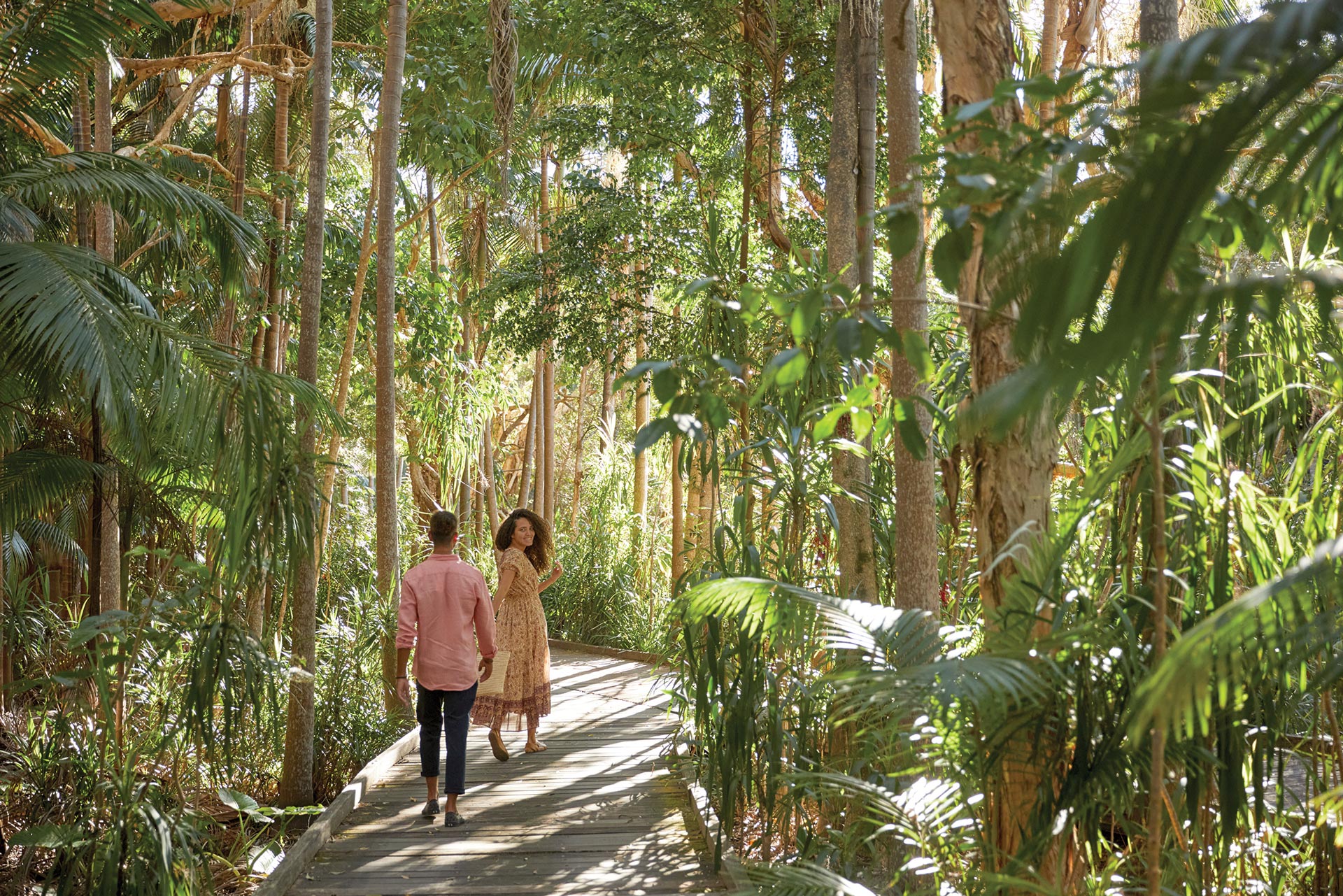 Couple walking through the Crystalbrook Byron Bay Rainforest Walk