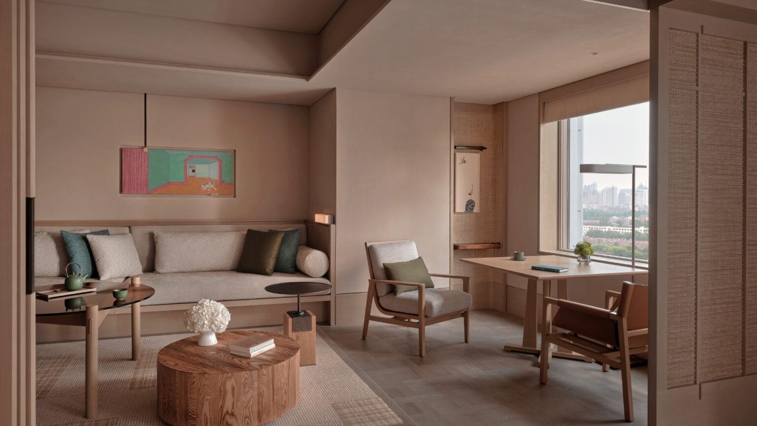 Alila Shanghai deluxe suite containing a couch and a table