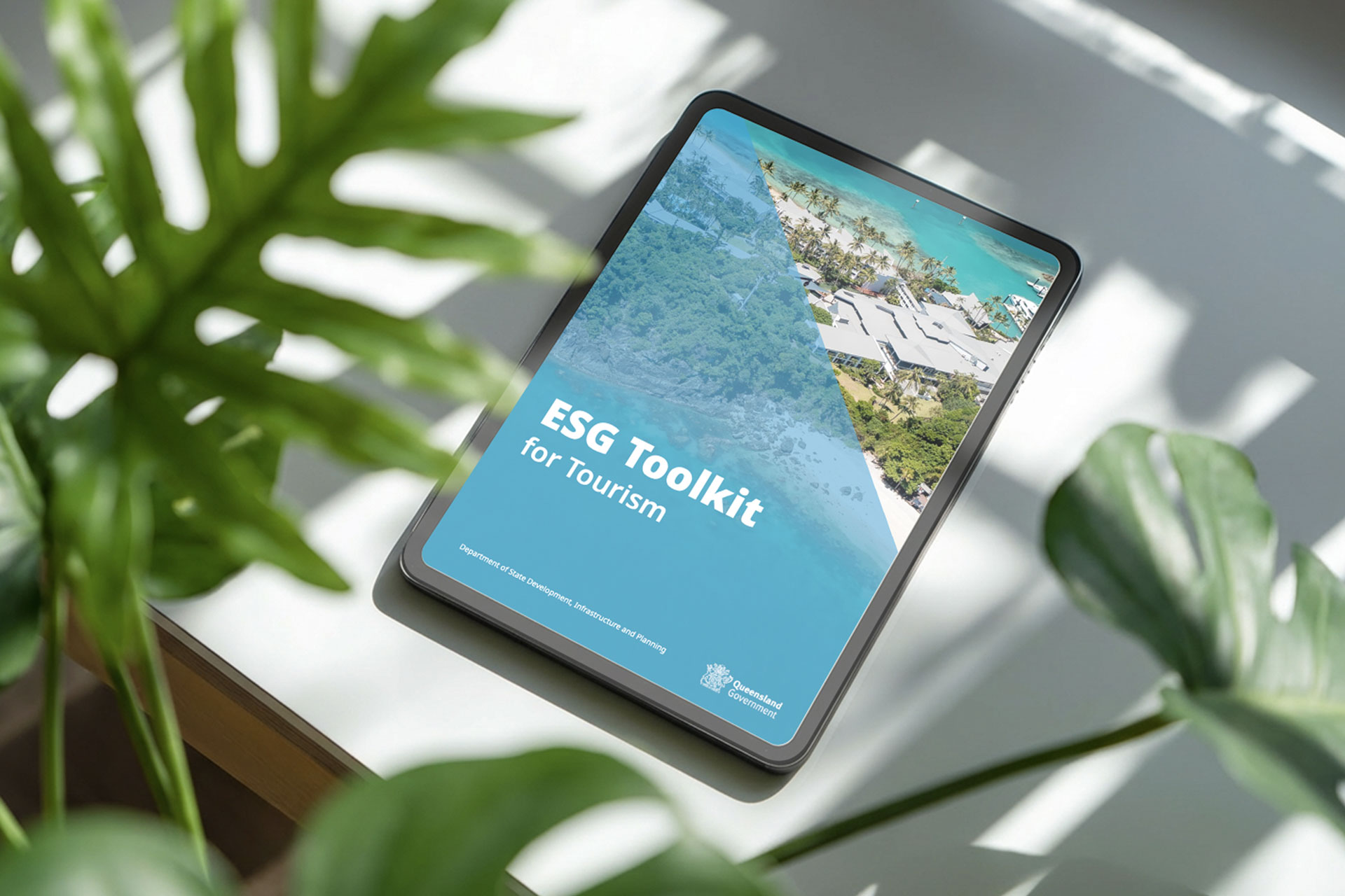 ESG Toolkit on an ipad with greenery around it